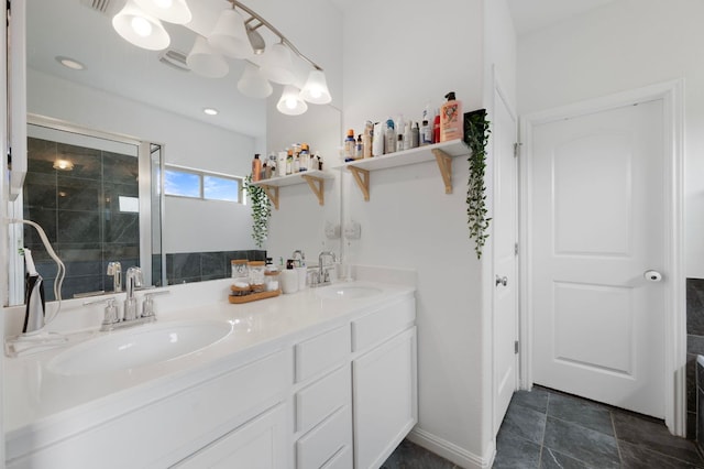 800 Totis Rd, Austin, TX 78748 - bathroom with a stall shower, double vanity, and a sink