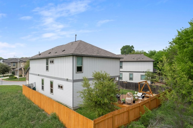 800 Totis Rd, Austin, TX 78748 - back of house featuring roof with shingles and fence