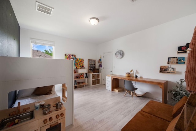 800 Totis Rd, Austin, TX 78748 - office with light wood finished floors and visible vents