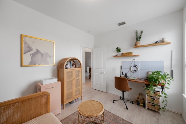 800 Totis Rd, Austin, TX 78748 - office space with baseboards, visible vents, and wood finished floors