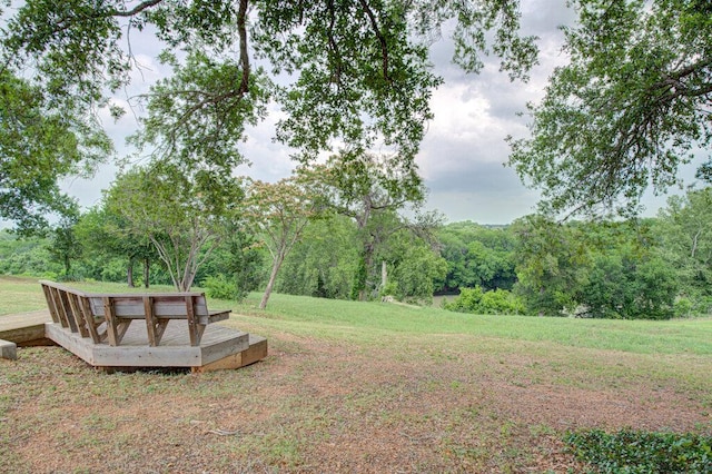 114 Joseph Hawkins Ln, Bastrop, TX 78602 - view of grassy yard with a wooded view