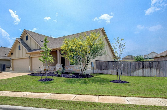 view of front of home featuring a garage, fence, a front lawn, board and batten siding, and concrete driveway