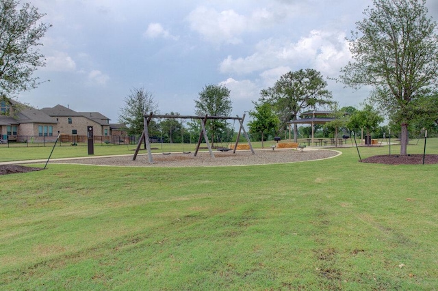 community playground with a gazebo and a lawn