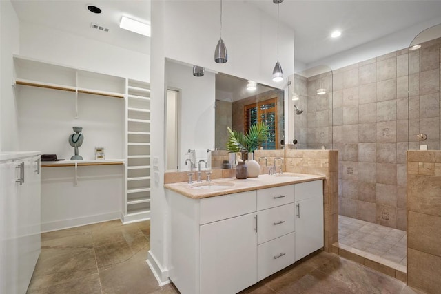 3007 Windsor Rd Unit B, Austin, TX 78703 - full bath featuring walk in shower, a spacious closet, double vanity, and recessed lighting