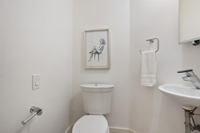 3007 Windsor Rd Unit B, Austin, TX 78703 - bathroom featuring toilet and baseboards