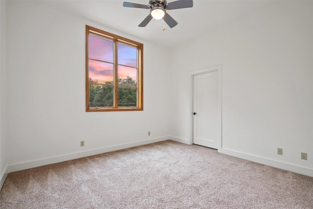 3007 Windsor Rd Unit B, Austin, TX 78703 - empty room featuring light carpet, baseboards, and ceiling fan