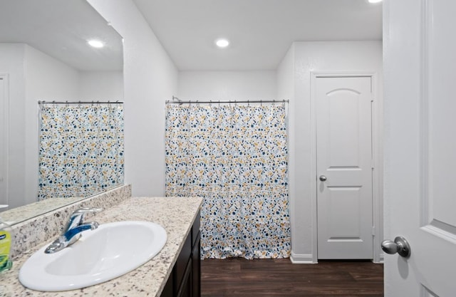 18720 Speculator Ln, Elgin, TX 78621 - bathroom with vanity, recessed lighting, a shower with curtain, and wood finished floors