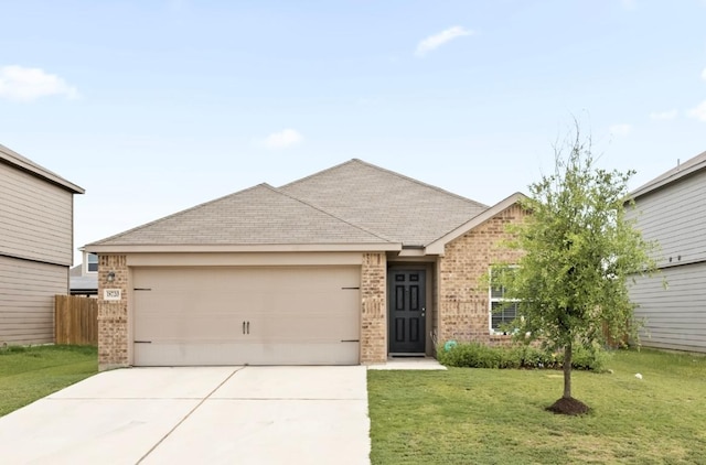 18720 Speculator Ln, Elgin, TX 78621 - ranch-style home with fence, brick siding, driveway, a garage, and a front yard