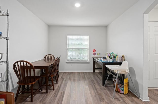 18720 Speculator Ln, Elgin, TX 78621 - dining space with baseboards and wood finished floors