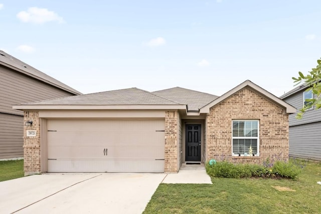 18720 Speculator Ln, Elgin, TX 78621 - single story home with driveway, brick siding, a garage, and a front yard