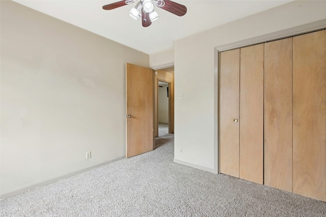 7000 Miranda Dr, Austin, TX 78752 - unfurnished bedroom with light colored carpet, a closet, and a ceiling fan