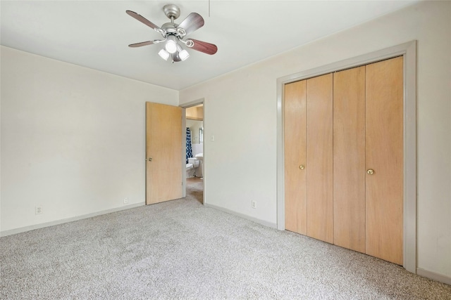 7000 Miranda Dr, Austin, TX 78752 - unfurnished bedroom featuring carpet floors, a closet, and a ceiling fan