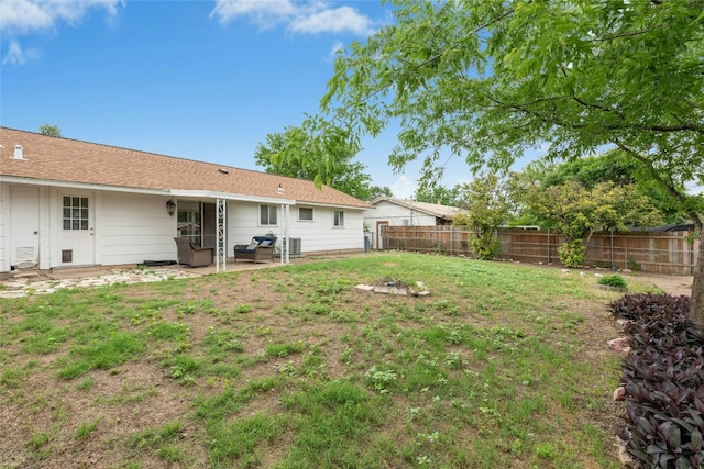 7000 Miranda Dr, Austin, TX 78752 - fenced backyard featuring a patio
