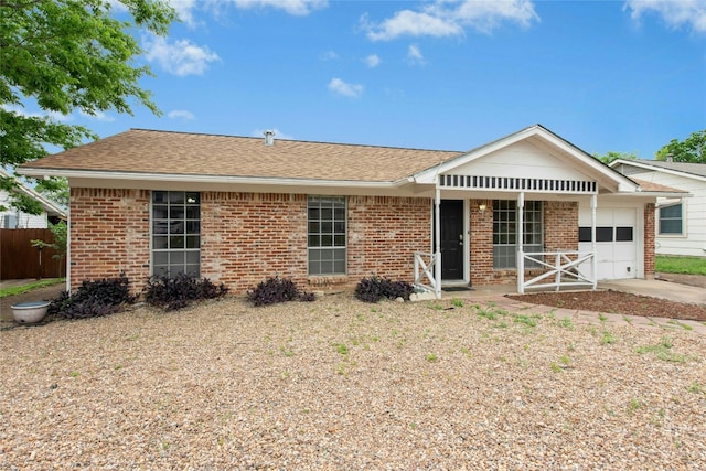 7000 Miranda Dr, Austin, TX 78752 - ranch-style home featuring an attached garage, brick siding, concrete driveway, and roof with shingles