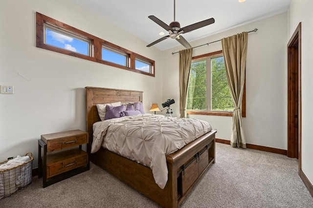 21216 Bertram Ln, Spicewood, TX 78669 - bedroom featuring light carpet, ceiling fan, and baseboards