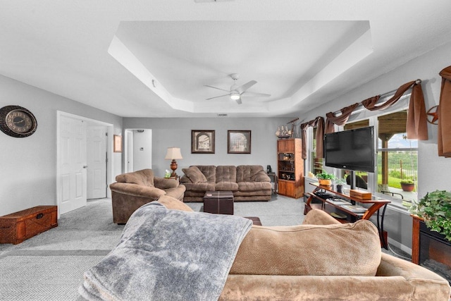 5315 Denmans Loop, Belton, TX 76513 - carpeted living room with a raised ceiling and ceiling fan