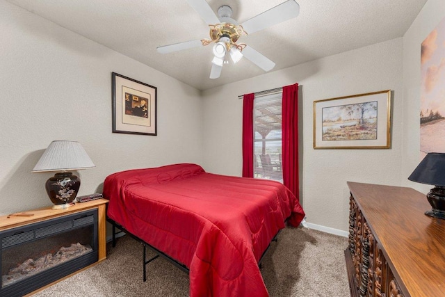 5315 Denmans Loop, Belton, TX 76513 - carpeted bedroom with ceiling fan, a textured wall, and baseboards