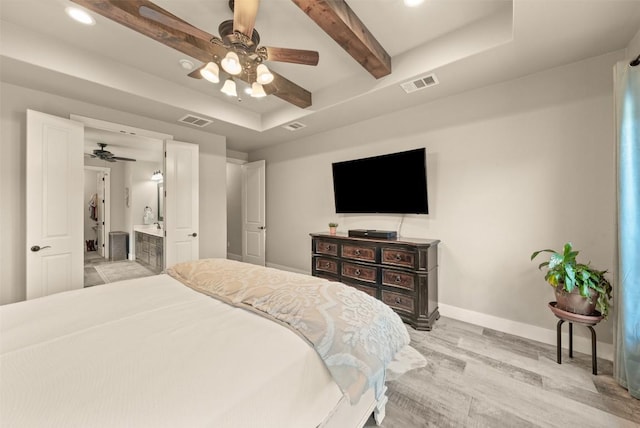 413 Creekside Dr, Salado, TX 76571 - bedroom with baseboards, light wood-type flooring, visible vents, and beam ceiling