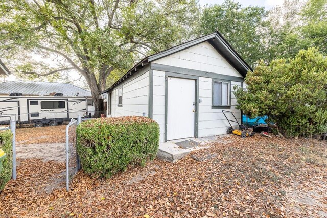 1226 Saint Matthew St, Gonzales, TX 78629 - view of outbuilding with an outdoor structure and fence
