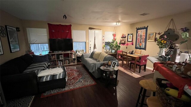 9625 Sugar Hill Dr, Austin, TX 78748 - living room featuring visible vents and wood finished floors