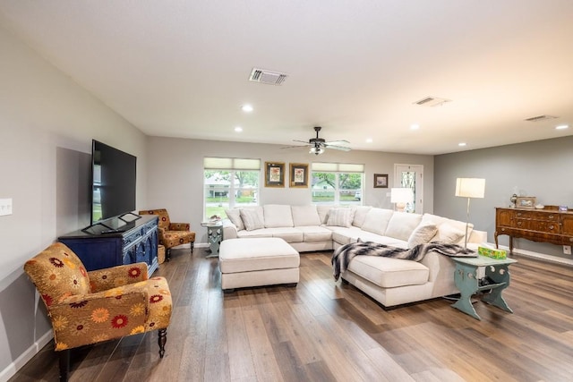 1318 Neuman St, Gonzales, TX 78629 - living area with wood finished floors, recessed lighting, baseboards, and a ceiling fan