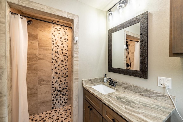 1318 Neuman St, Gonzales, TX 78629 - bathroom featuring vanity and a tile shower