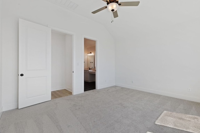 1108 Snowdrop Dr, Georgetown, TX 78628 - unfurnished bedroom with carpet, vaulted ceiling, connected bathroom, and a ceiling fan