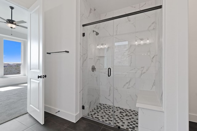 1108 Snowdrop Dr, Georgetown, TX 78628 - bathroom featuring a marble finish shower, ceiling fan, and tile patterned floors