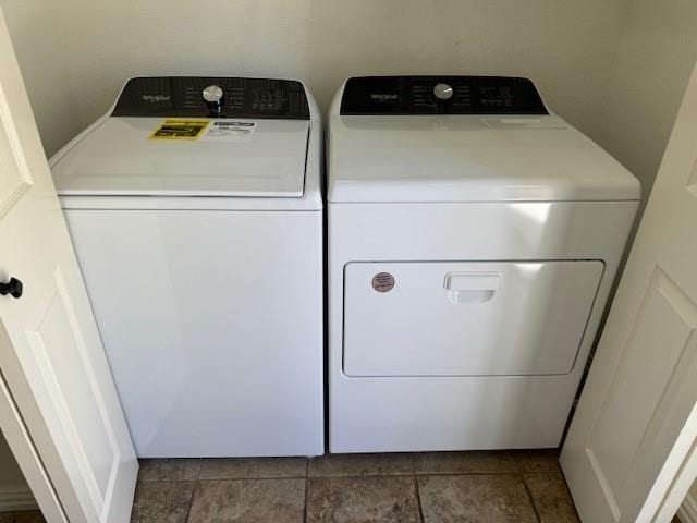 washroom featuring laundry area and washer and dryer