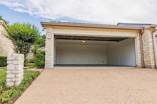 garage with driveway