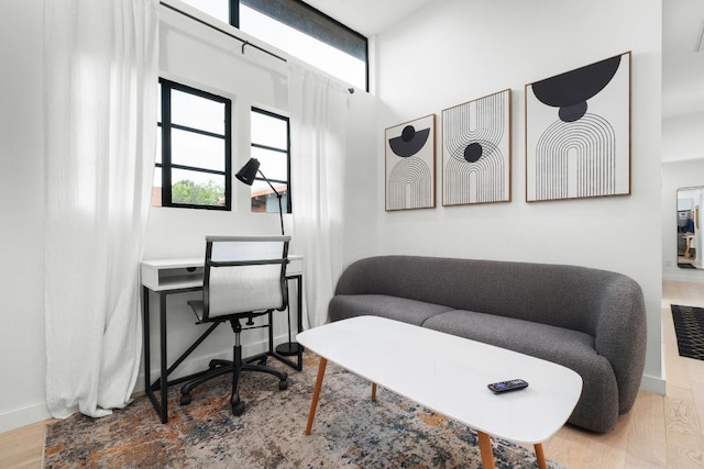 400 E 30th St Unit 200, Austin, TX 78705 - office featuring wood finished floors, baseboards, and a towering ceiling