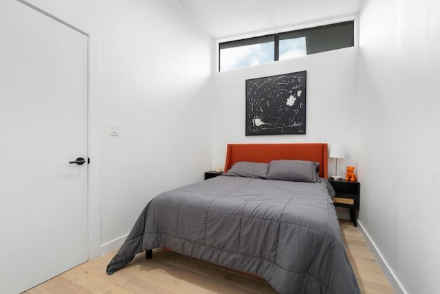 400 E 30th St Unit 200, Austin, TX 78705 - bedroom with wood finished floors and baseboards