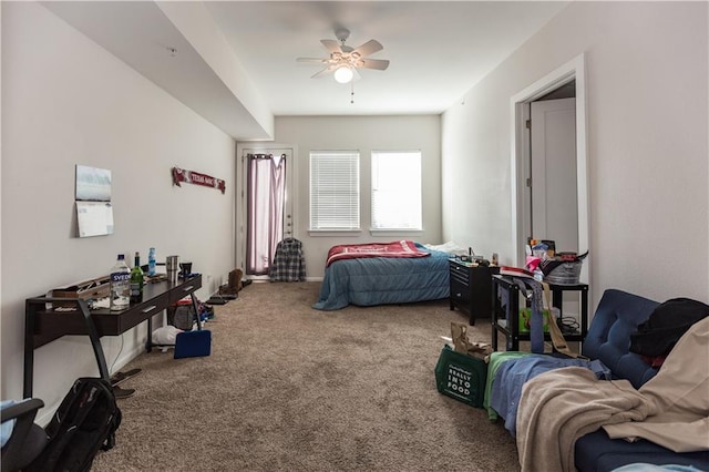 carpeted bedroom with a ceiling fan