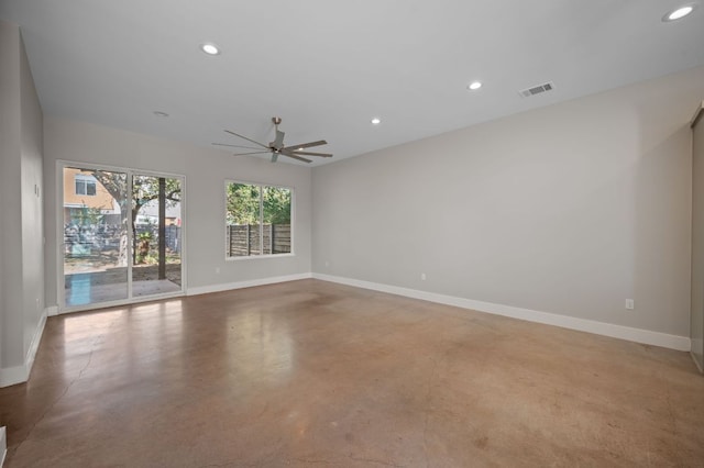 1210 Stobaugh St Unit B, Austin, TX 78757 - empty room with finished concrete floors, baseboards, ceiling fan, and recessed lighting