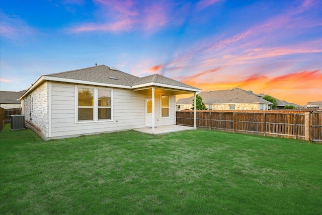 201 Cascata Way, Liberty Hill, TX 78642 - back of property with central air condition unit, a patio, and a shingled roof