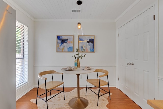 14400 Weldon Ln, Austin, TX 78728 - dining room with wood finished floors, wooden ceiling, and ornamental molding