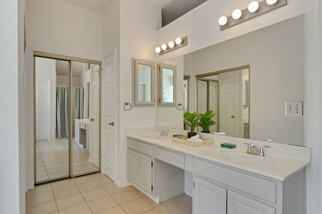 14400 Weldon Ln, Austin, TX 78728 - full bath featuring tile patterned flooring and double vanity