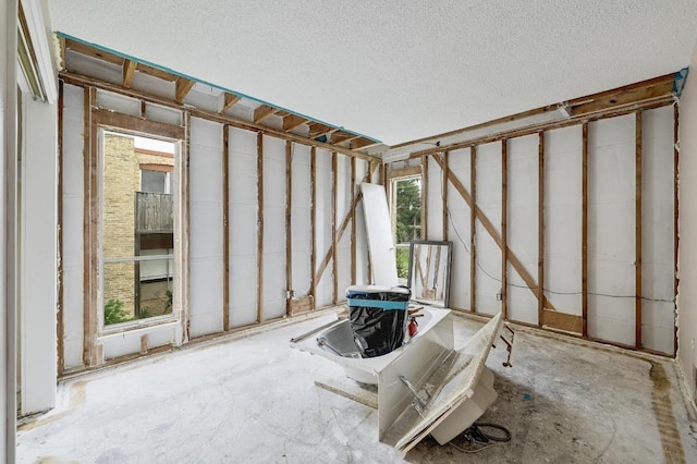 interior space featuring a textured ceiling