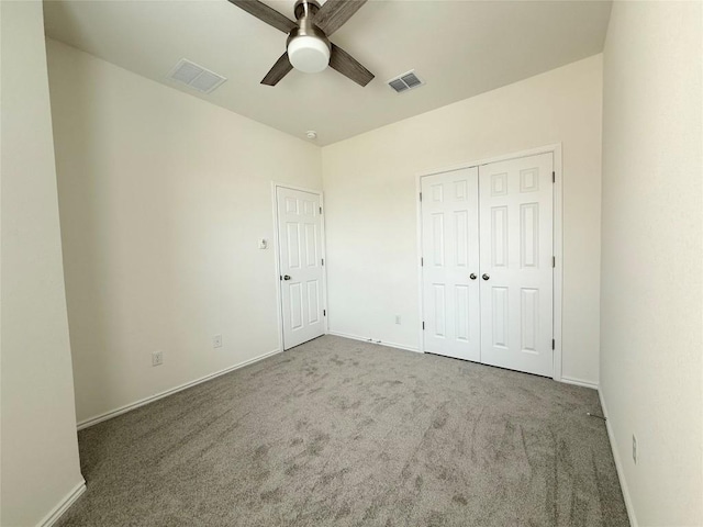 4482 Acerno St, Round Rock, TX 78665 - unfurnished bedroom with carpet floors, a closet, and a ceiling fan