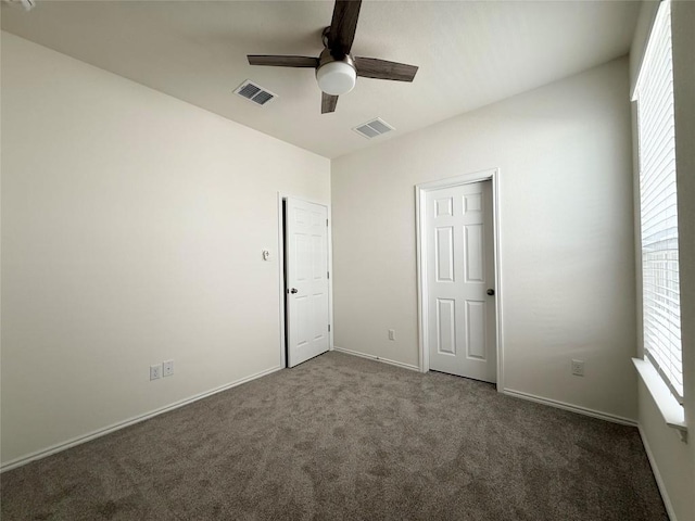 4482 Acerno St, Round Rock, TX 78665 - unfurnished bedroom with carpet floors and a ceiling fan