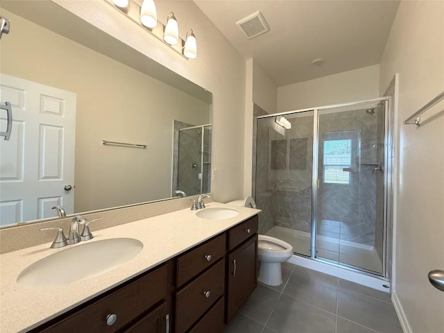 4482 Acerno St, Round Rock, TX 78665 - full bathroom with tile patterned flooring, a stall shower, and double vanity