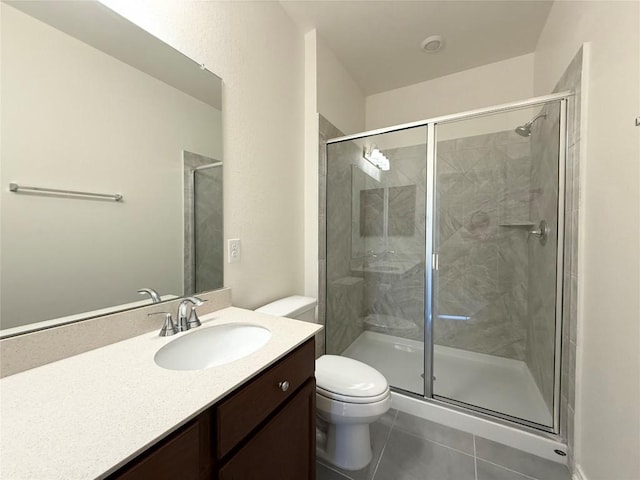 4482 Acerno St, Round Rock, TX 78665 - bathroom featuring a shower stall, vanity, and tile patterned flooring