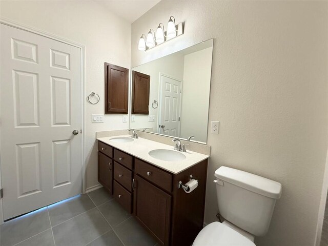 4482 Acerno St, Round Rock, TX 78665 - bathroom featuring tile patterned floors and double vanity
