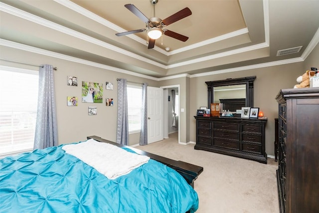 7241 Dunns Point Dr, Corpus Christi, TX 78414 - bedroom with light colored carpet, visible vents, crown molding, a ceiling fan, and a tray ceiling