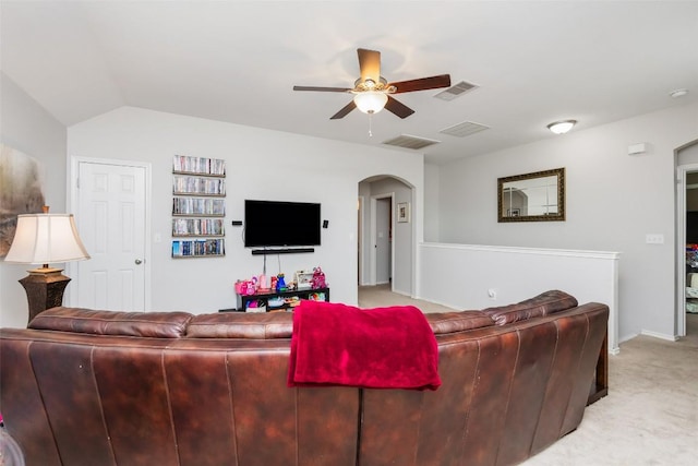 7241 Dunns Point Dr, Corpus Christi, TX 78414 - living area with light colored carpet, ceiling fan, arched walkways, and visible vents
