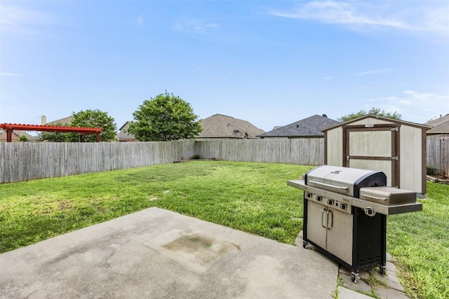 7241 Dunns Point Dr, Corpus Christi, TX 78414 - view of yard featuring a patio area, an outdoor structure, a fenced backyard, and a shed