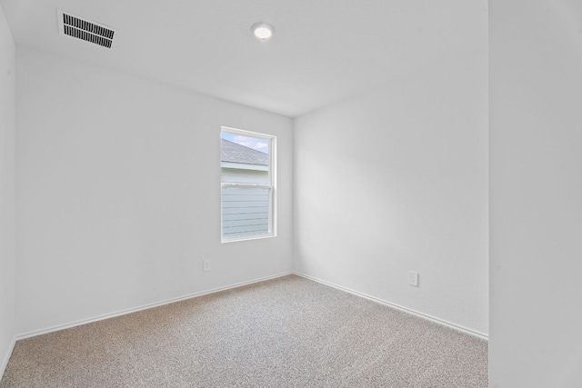 127 Safflower Dr, Uhland, TX 78640 - spare room featuring baseboards, carpet flooring, and visible vents
