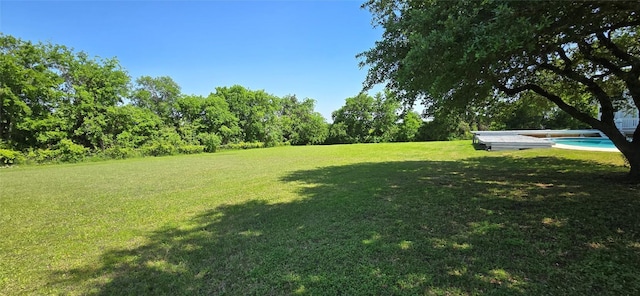 8660 Cedar Hill Rd, Brenham, TX 77833 - view of grassy yard with a pool