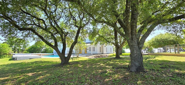 8660 Cedar Hill Rd, Brenham, TX 77833 - view of green lawn with an outdoor pool