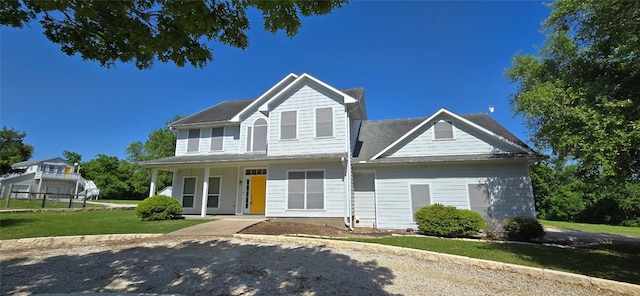 8660 Cedar Hill Rd, Brenham, TX 77833 - view of front of property with a porch and a front lawn